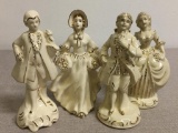 Group of Four Porcelain Figurines