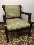 Antique Rolling Arm Chair