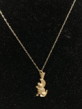 14K Gold Chain and Wolf/Moon Charm Weight .07 oz