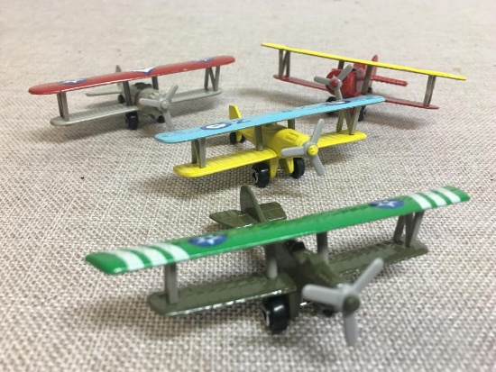 Group of 4 Miniature Metal Die Cast Airplanes
