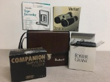 Group of Binoculars and Tape Recorder in Box