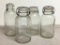 Group of 4 Vintage Clear Glass Jars w/Locking Lid