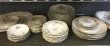 Shelf Lot of Porcelain Plates, Serving Bowls, Saucers and More
