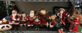 Shelf Lot of Santa?s and Christmas Decor