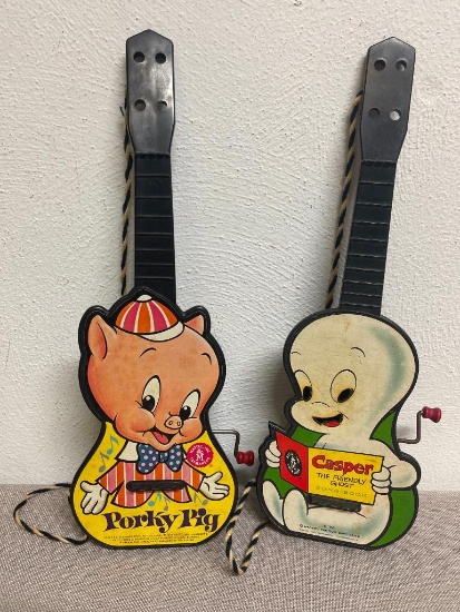Pair of Plastic Kid's Windup Musical Guitars