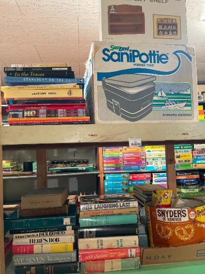 Three Shelf Lot of Misc Books, Reagan/Bush Signs, SaniPottie and More (Basement)