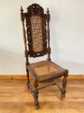 Ornate Wooden Chair with Cane Back and Bottom