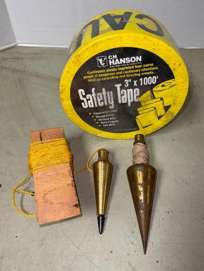 Two Brass Plumb Bobs and New Roll of Caution Tape
