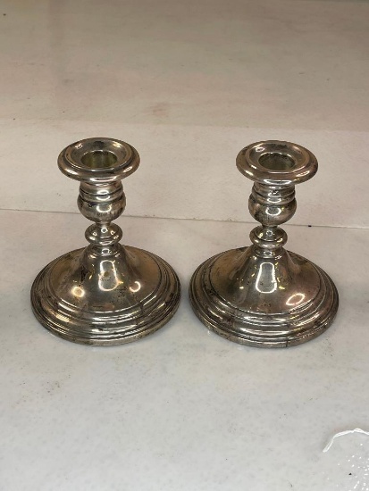 2 sterling candleholders