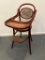 Antique High Chair with Damage to Cane Work on the Back
