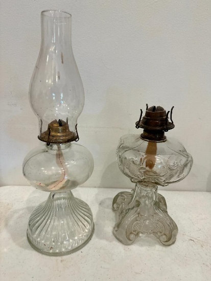 Two Clear Glass Oil Lamps, One Does Not Have Chimney