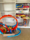 Group of Toys and Hot Wheels Racetrack