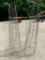 Two Stacks of Tomato Cages