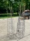 Two Stacks of Tomato Cages