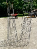 Two Stacks of Tomato Cages
