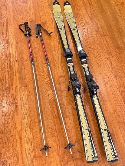 Pair of Elan Parabolic Snow Skis with Poles