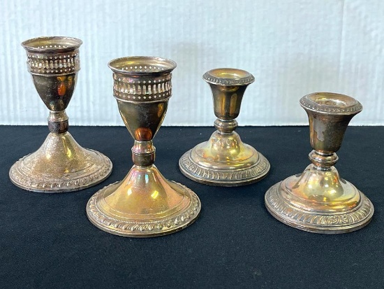 Mixed Pair of Weighted Sterling Silver Candlestick Holders