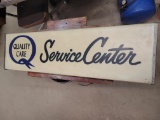 Quality Care Service Center Sign