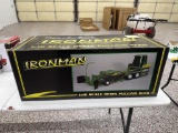Spec Cast Iron Man Pulling Sled (green)