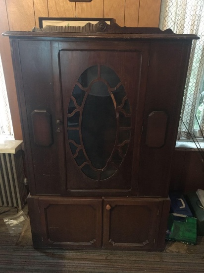 Vintage china cabinet converted to gun cabinet