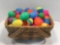 Plastic Easter eggs in woven basket