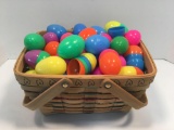 Plastic Easter eggs in woven basket