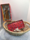 Wicker laundry basket, extension cord, doll