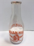 Vintage one quart milk bottle (INDIAN HILL FARM DAIRY Greenville, ME)