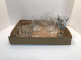 Stemware etched w/ a sailing ship, blue glass stemware, glass jar w/ lid, more