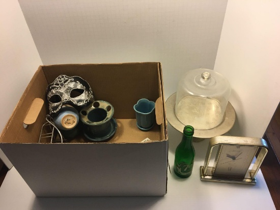 Mantel clock, vintage 7-Up bottle, covered cake pan, flowerpots, more
