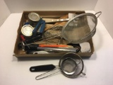 Strainers, whisk, kitchen utensils, more