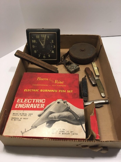 Vintage alarm clock, vintage tape measure, pocket knives, lock, electric burning pen set, electric