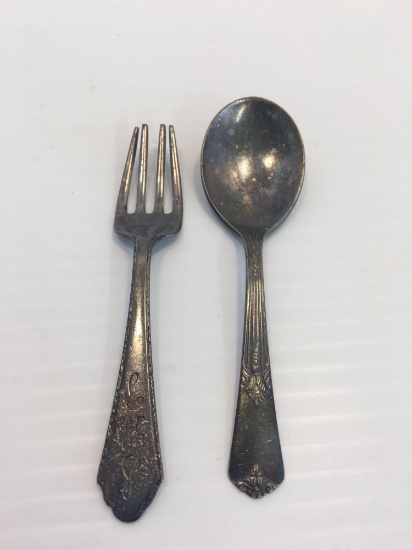 Silver baby fork and spoon (per seller 1945; fork is stamped Sterling)