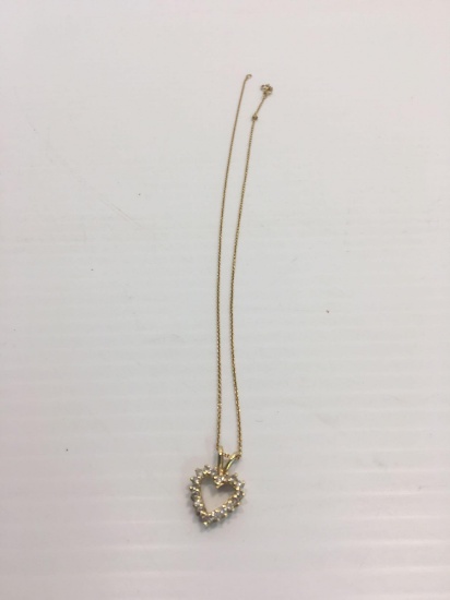 Heart shaped Necklace(marked Italian design 14k;per seller diamonds)