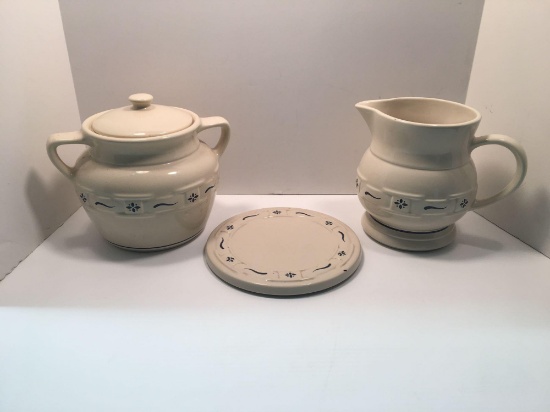 Longaberger pottery: pitcher, hot plate, cookie jar (matching)