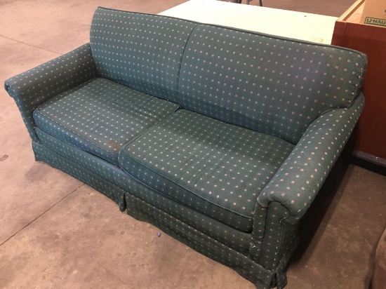 Green fabric couch w/ fold out bed