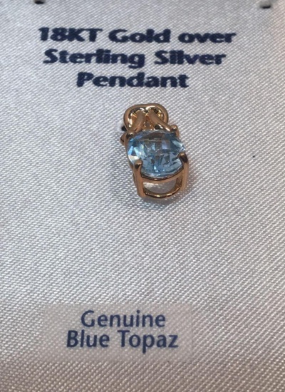Genuine blue topaz pendant (18 karat gold over sterling silver pendant)