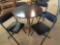 4 folding chairs,small round table