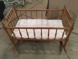 Vintage wooden doll cradle