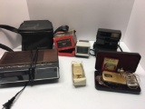 2 vintage POLAROID cameras,SANYO alarm clock,MICO Tele vue,2 vintage ZENITH hearing aids