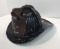 Antique metal CAIRNS fire helmet