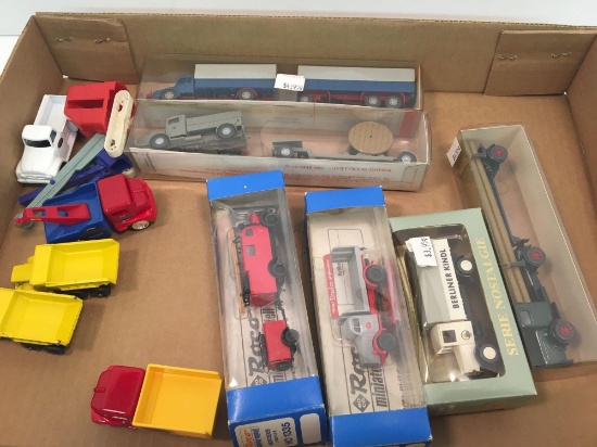 Plastic and die cast trucks