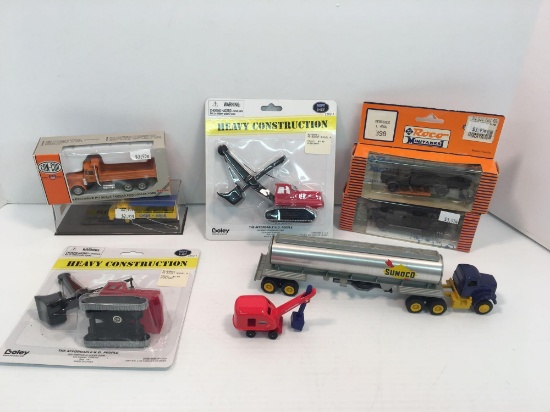 2 plastic steam shovels,die cast SUNOCO tractor/trailer,plastic army trucks,constructions