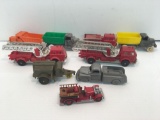 Plastic dump trucks and fire trucks,more