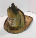 Antique fire helmet/metal shield 
