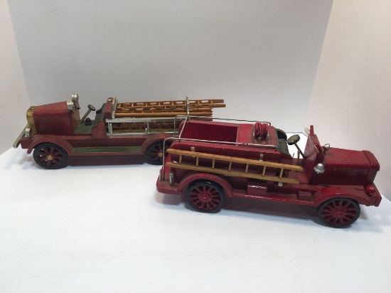 2 handcrafted wooden fire trucks