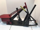Vintage pressed metal steam shovel(mounted;operational toy)