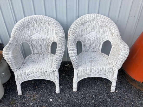 2 matching white wicker chairs