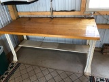 Butcher top work bench/attatched light(must bring wrench to pickup)