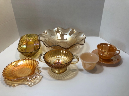 Carnival glass lot(centeriece bowl,bread dish,seashell dish,2 handled bowl,cup/saucer,cup)